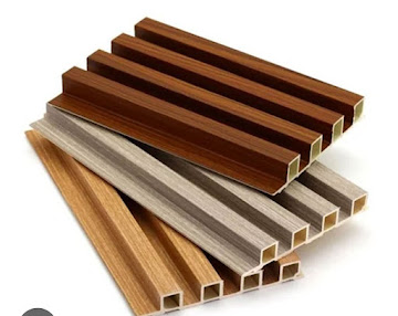Fluted WPC wall panel louvers in various wood grains by Andhra Furniture and Interiors