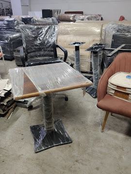 Office workstation tables and chairs ready for delivery